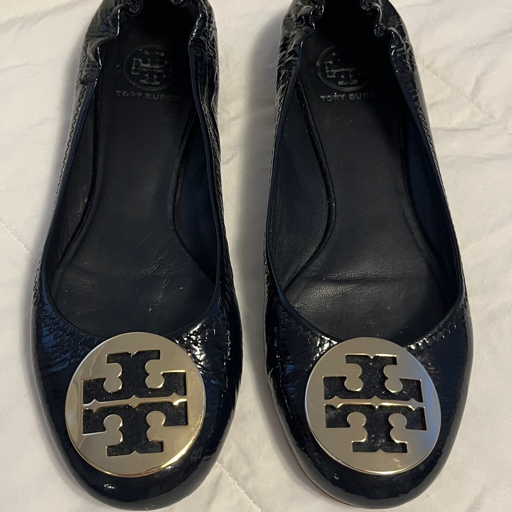 Tory Burch Shiny Black Flats with Gold Emblem